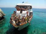 A happy crowded boat excursion in Cyprus.